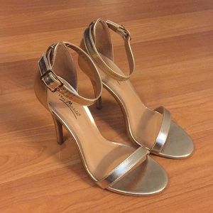 Gold ankle strap stiletto heels